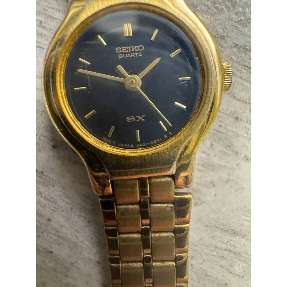 Seiko SX V401-0091 Womens Quartz Wristwatch Gold Tone Black Dial Vintage